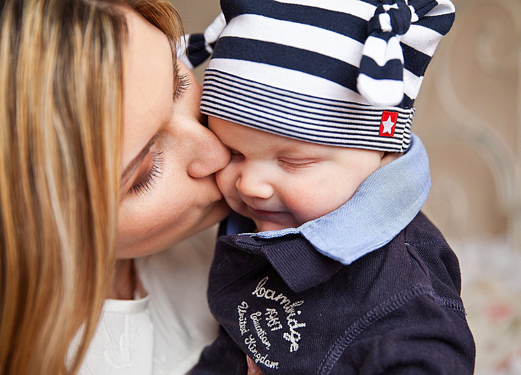 NAPPR - Child Care & Home Based Support - Mother kissing infant